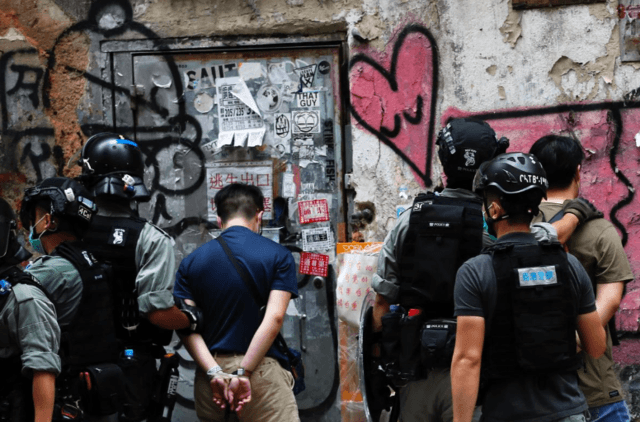 Hong Kong police arrest nearly 200 in first protest under new security law Hong Kong police arrest nearly 200 in first protest under new security law