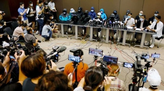 Hong Kong says will not interfere with Chinese law enforcement arrest of 12 residents at sea Hong Kong says will not interfere with Chinese law enforcement arrest of 12 residents at sea