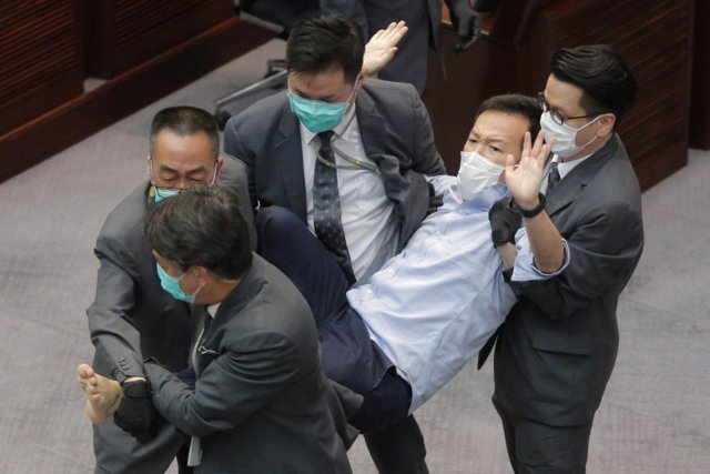 3 former pro-democracy lawmakers arrested in Hong Kong 3 former pro-democracy lawmakers arrested in Hong Kong