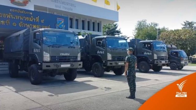 Army trucks and men on standby in case truckers go on strike in Bangkok