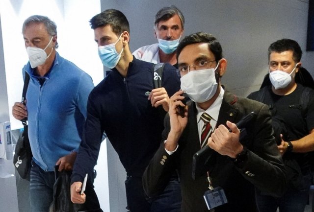'You are our champion': deported Djokovic welcomed home to Serbia