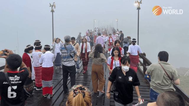 Tourists flock to a misty Saphan Mon in Kanchanaburi