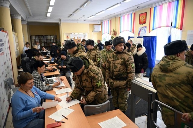 Polls open in Russian vote to extend Putin's reign Polls open in Russian vote to extend Putin's reign