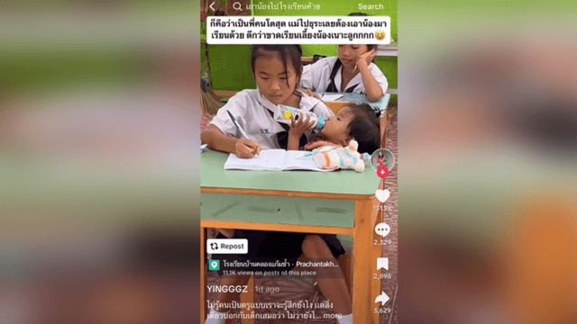 Viral video: 5th grader feeding toddler while studying in class Viral video: 5th grader feeding toddler while studying in class