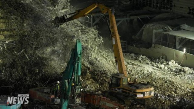 More heavy machinery used to clear debris from collapsed SAO building