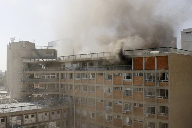 Iranian missile hits main hospital in southern Israel as strikes wound dozens Iranian missile hits main hospital in southern Israel as strikes wound dozens