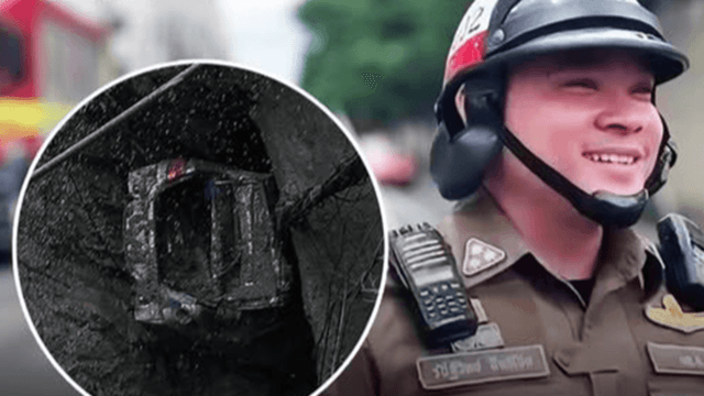 Traffic cop stays on duty despite car falling into 15-metre sinkhole Traffic cop stays on duty despite car falling into 15-metre sinkhole