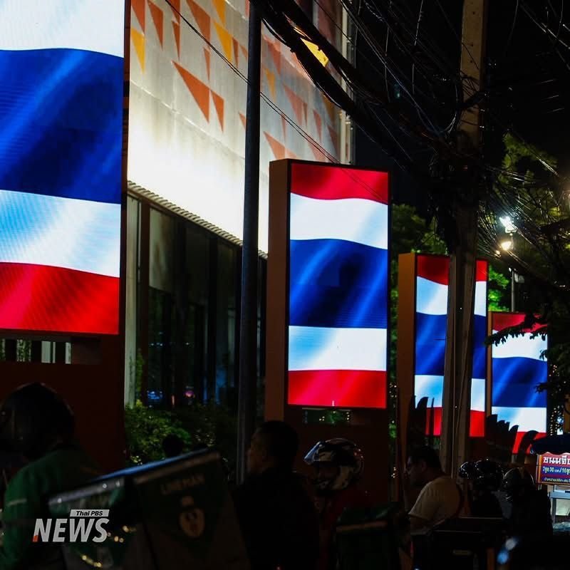 Bangkok buildings light up in colours of Thai national flags