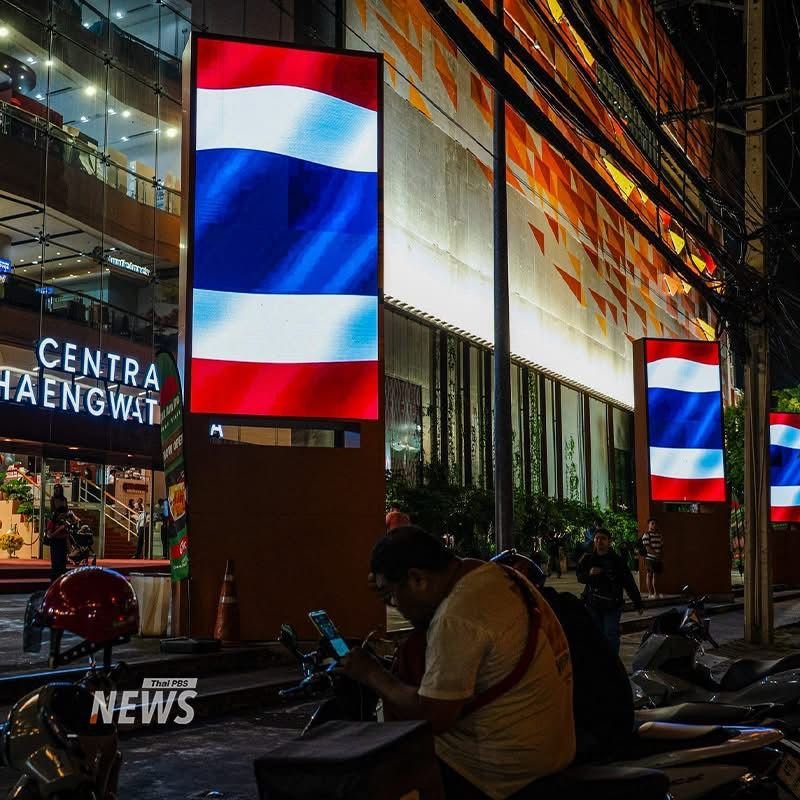 Bangkok buildings light up in colours of Thai national flags