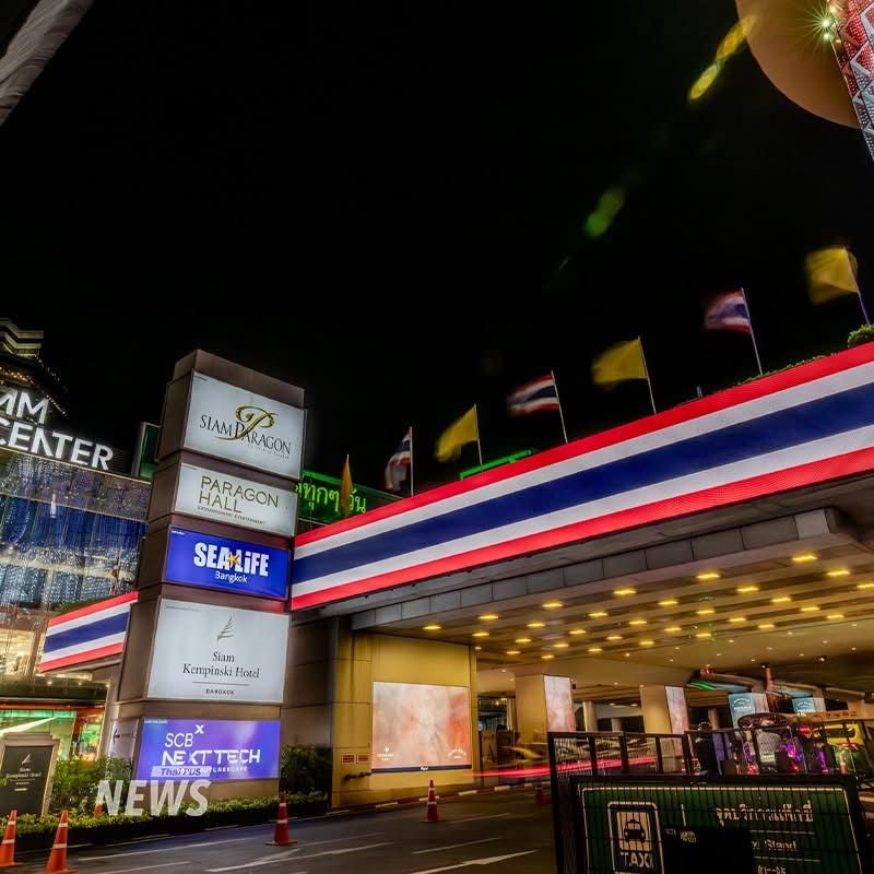 Bangkok buildings light up in colours of Thai national flags