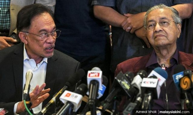 Mahathir given mandate to stay on until after November Mahathir given mandate to stay on until after November