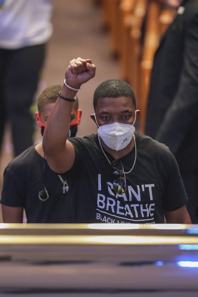 Thousands mourn George Floyd as accused officer appears in court Thousands mourn George Floyd as accused officer appears in court
