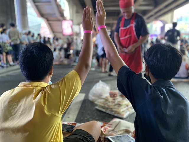 Young protesters gather around Siam Square BTS station in Bangkok Young protesters gather around Siam Square BTS station in Bangkok