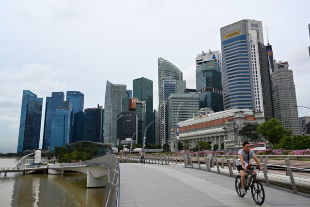 Singapore's virus-hit economy suffers worst decline in 2020 Singapore's virus-hit economy suffers worst decline in 2020