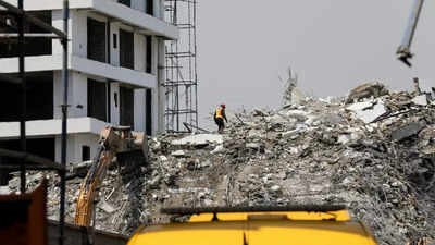 Death toll climbs to 22 in Lagos high-rise collapse Death toll climbs to 22 in Lagos high-rise collapse