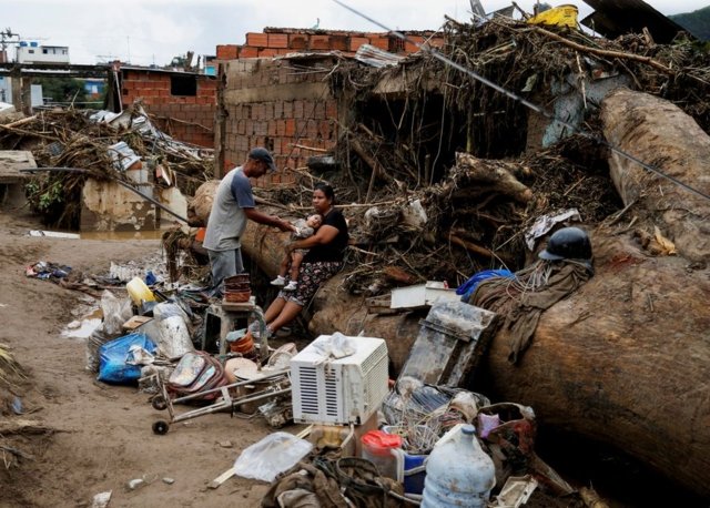 Venezuela landslides kill four after flooding Venezuela landslides kill four after flooding