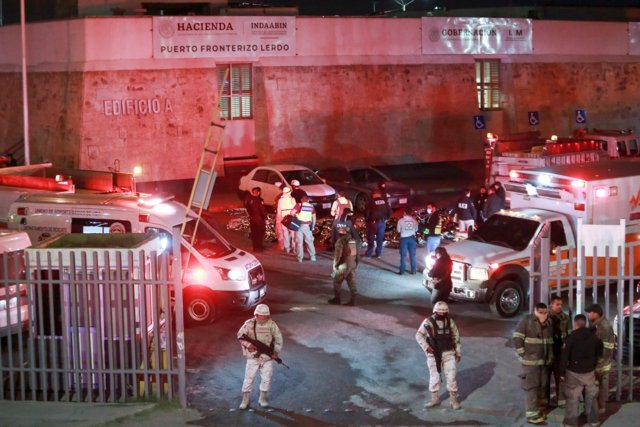 Video shows guards walking away during fire that killed 40 in Mexico Video shows guards walking away during fire that killed 40 in Mexico