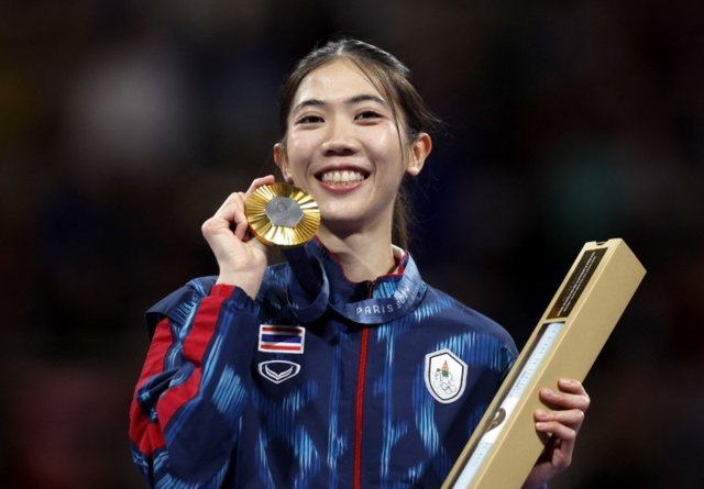 Thailand's Panipak wins historic flyweight gold Thailand's Panipak wins historic flyweight gold