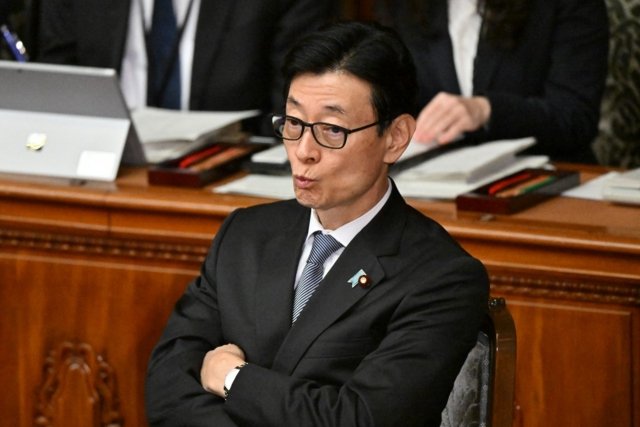 Three Japanese ministers resign over kickbacks scandal: reports Three Japanese ministers resign over kickbacks scandal: reports