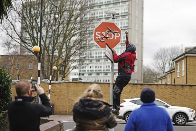 Police arrest man after Banksy installation removed from London street Police arrest man after Banksy installation removed from London street