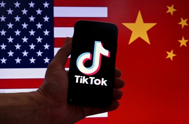 US ambassador says Beijing stance on TikTok ban 'supremely ironic' US ambassador says Beijing stance on TikTok ban 'supremely ironic'