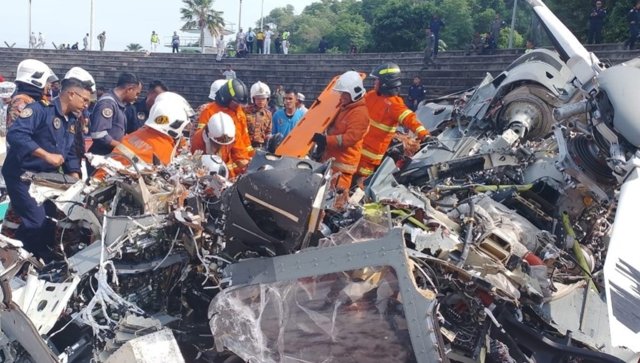 Two military choppers collide in Malaysia killing 10 crew Two military choppers collide in Malaysia killing 10 crew